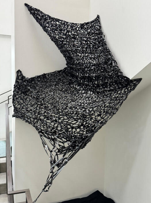 "Home Comforts I," 2025. Crocheted VHS tape, varied dimension.