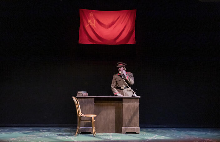 Actors: Dutch VanOmmen; Props: Desk (Designed by Tucker Goodman and built by the Production Practicum team), Desk Dressing, Telephone