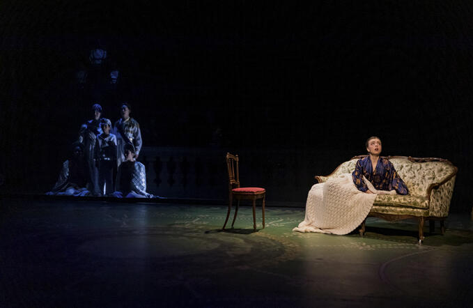 Actors: Josephine Partridge, Ensemble; Props: Hotel Chair, Blanket, Loveseat