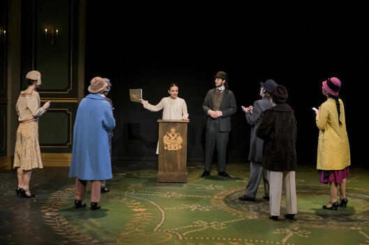 Actors: Gabriela Tolomei, Jack D'Agostino, Ensemble; Props: Legal File, Lectern, Notepads